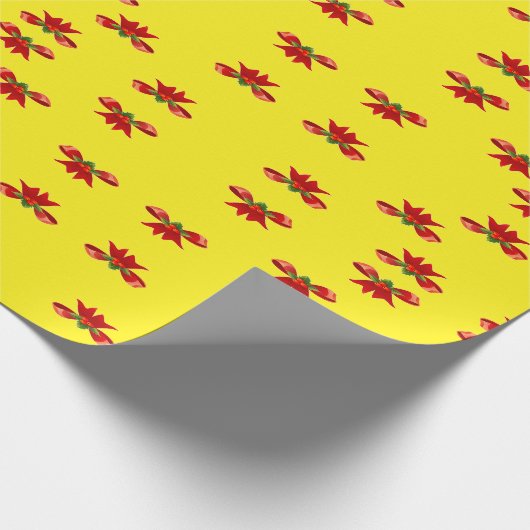 Kerstrood lint op geel cadeaupapier (Hoek)