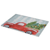 Kerstroodbedekking vrachtwagen op een sneeuwweg snijplank (Hoek)