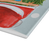 Kerstroodbedekking vrachtwagen op een sneeuwweg snijplank (Hoek)