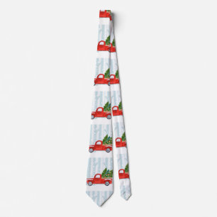 Kerstroodbedekking vrachtwagen op een sneeuwweg stropdas