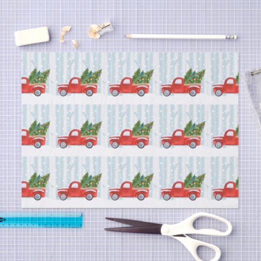 Kerstroodbedekking vrachtwagen op een sneeuwweg tissuepapier (Craft)