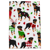 Kerstrottweiler met gemiddelde cadeautas (Voorkant)