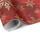 kerstschilfers met rode en gouden sneeuwvlokken cadeaupapier (Rol Hoek)