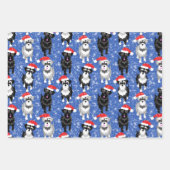 Kerstschnauzers die in de sneeuw spelen inpakpapier vel (Voorkant)
