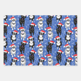 Kerstschnauzers die in de sneeuw spelen inpakpapier vel