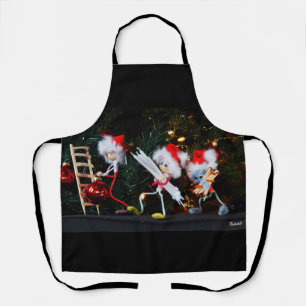 Kerstsfeer met Fubby's die de decoratie verzorgen. Schort