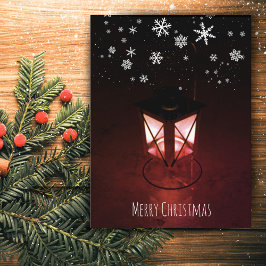 Kerstsfeer met kaarslantaarn en sneeuwvlokken feestdagenkaart