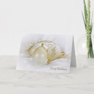 kerstsieraden met witte en gouden kerst kaart
