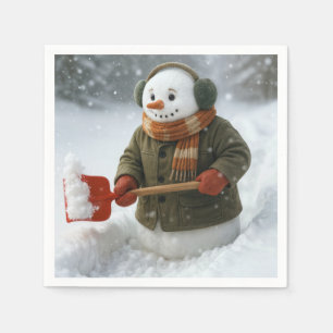 Kerstsneeuwman die sneeuw schept servet
