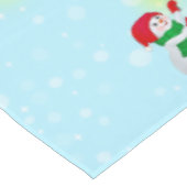 Kerstsneeuwman op lichtblauw tafelkleed (Gekanteld)