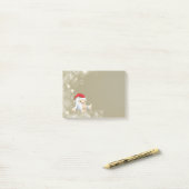 Kerstsneeuwpop met een rode kersthat post-it® notes (Op bureau)