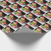 Kerstsneeuwpop op een bord cadeaupapier (Hoek)