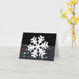 Kerstsneeuwvlokken en -bladeren met zwarte rug kaart