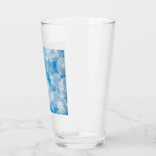 Kerstsneeuwvlokken op een blauwe achtergrond glas (Links)