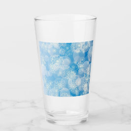 Kerstsneeuwvlokken op een blauwe achtergrond glas