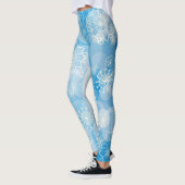 Kerstsneeuwvlokken op een blauwe achtergrond leggings (Links)