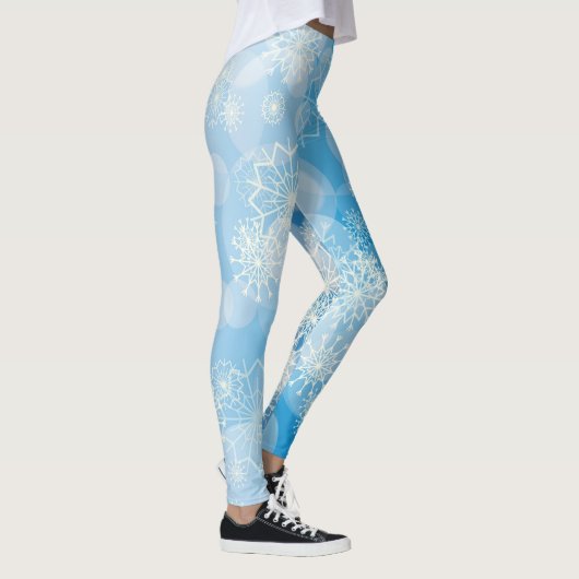 Kerstsneeuwvlokken op een blauwe achtergrond leggings (Rechts)
