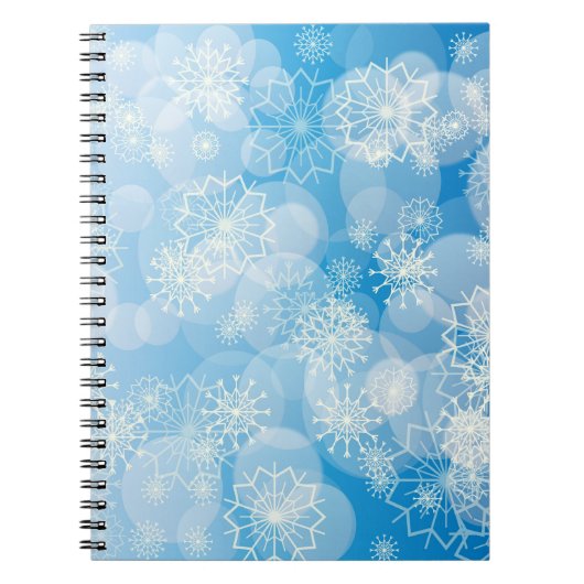Kerstsneeuwvlokken op een blauwe achtergrond notitieboek (Voorkant)