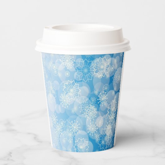 Kerstsneeuwvlokken op een blauwe achtergrond papieren bekers (Achterkant)