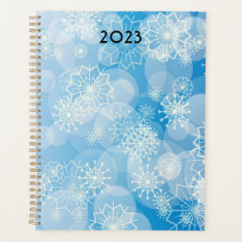 Kerstsneeuwvlokken op een blauwe achtergrond planner