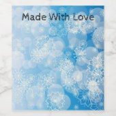 Kerstsneeuwvlokken op een blauwe achtergrond wijn etiket (Enkel label)