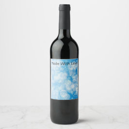 Kerstsneeuwvlokken op een blauwe achtergrond wijn etiket