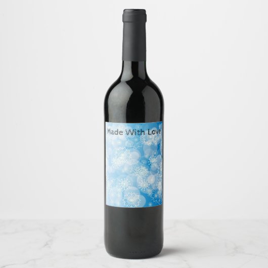 Kerstsneeuwvlokken op een blauwe achtergrond wijn etiket (Voorkant)