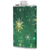 Kerstsneeuwvlokken op groene achtergrond heupfles (Links)