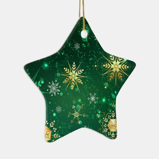 Kerstsneeuwvlokken van goud op een groene achtergr keramisch ornament (Rechts)