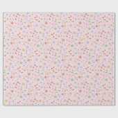 Kerstsnoepjes op roze cadeaupapier (Vlak)