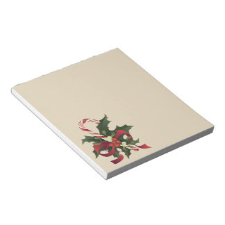 kerstsnoepriet in een mistletoe en een holly berr notitieblok