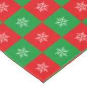 kerstsnowflakes op rode en groene tablet tafelkleed (Gekanteld)