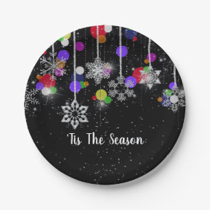 kerstsnowflakes op zwart papieren bordje