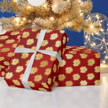Kerstster poinsettia's in goud op rood