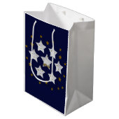 Kerststerren op blauw medium cadeauzakje (Voorkant Gekanteld)