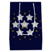 Kerststerren op blauw medium cadeauzakje (Achterkant)