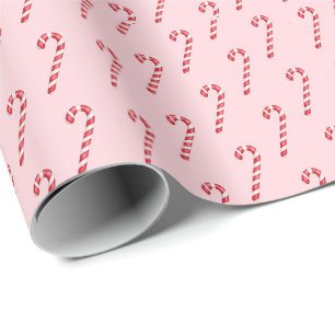 Kerststok rood witte strepen op roze waterverf cadeaupapier