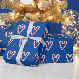 Kerststokharten in Sneeuwvlokken Op Blauw Cadeaupapier