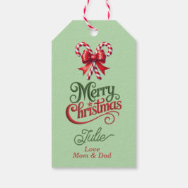 Kerststokken met rode strik vrolijk kerstfeest cadeaulabel