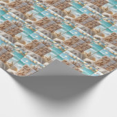 Kerststrandcadeau met zeesterren cadeaupapier (Hoek)