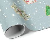 kerstsuikerkoekjes op sneeuwvlokken cadeaupapier (Rol Hoek)