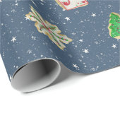 kerstsuikerkoekjes op sterren cadeaupapier (Rol Hoek)