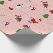 kerstteken op roze en goudglitter cadeaupapier (Hoek)