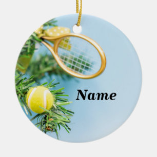 Kersttennisbal en racket, met boom keramisch ornament