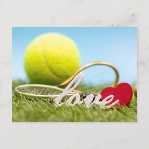 Kersttennisbal en racket met liefde feestdagenkaart