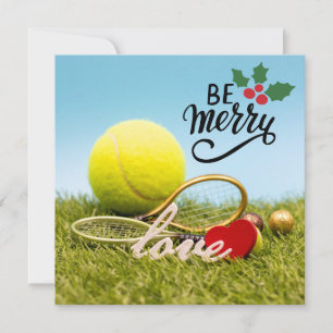Kersttennisbal en racket met liefde feestdagenkaart
