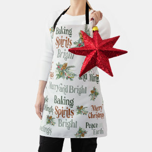 Kersttypografie met hulst en dennenappels schort