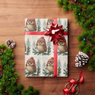 Kerstuil in een wintermuts cadeaupapier