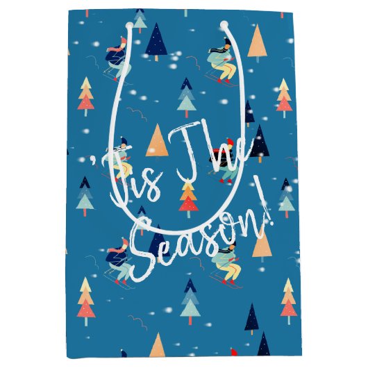 kerstvaarder in sneeuwvlokken op blauw medium cadeauzakje (Voorkant)