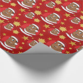 Kerstvader/jonge man cartoon cadeaupapier (Hoek)